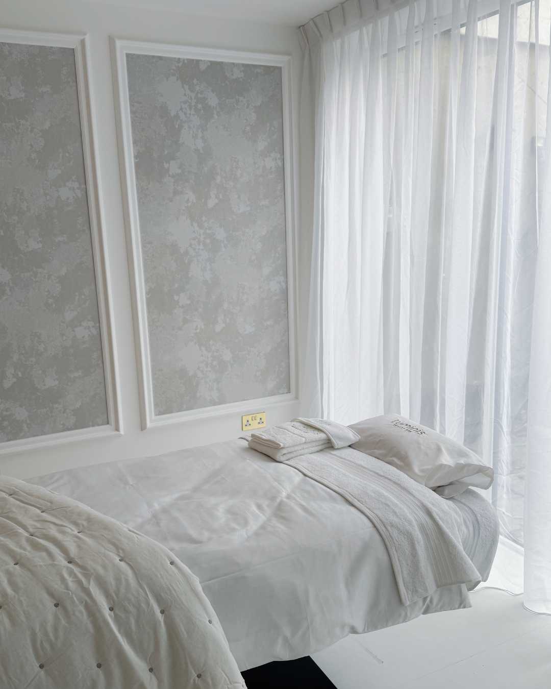 Interior details of a modern beauty spa treatment bed located at Luminis Chislehurst.