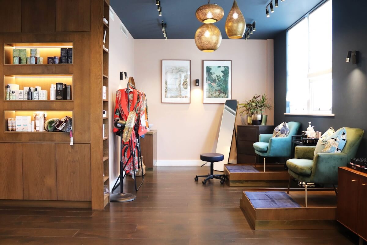 The interior of Luminis Chiswick beauty salon, featuring manicure and pedicure stations