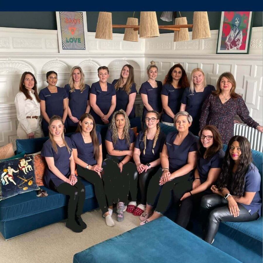 A group photo of all the therapists and team members working at Luminis Beauty Salon.