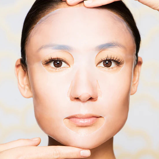 A close up of a model with a Skimono Face Mask on.