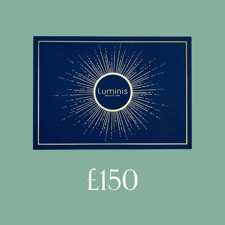 A flat lay photo of a Luminis Gift card featuring a green background and £150 title below.