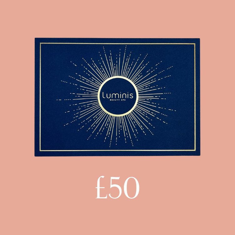 A flat lay photo of a Luminis Gift card featuring a peach background and £50 title below.