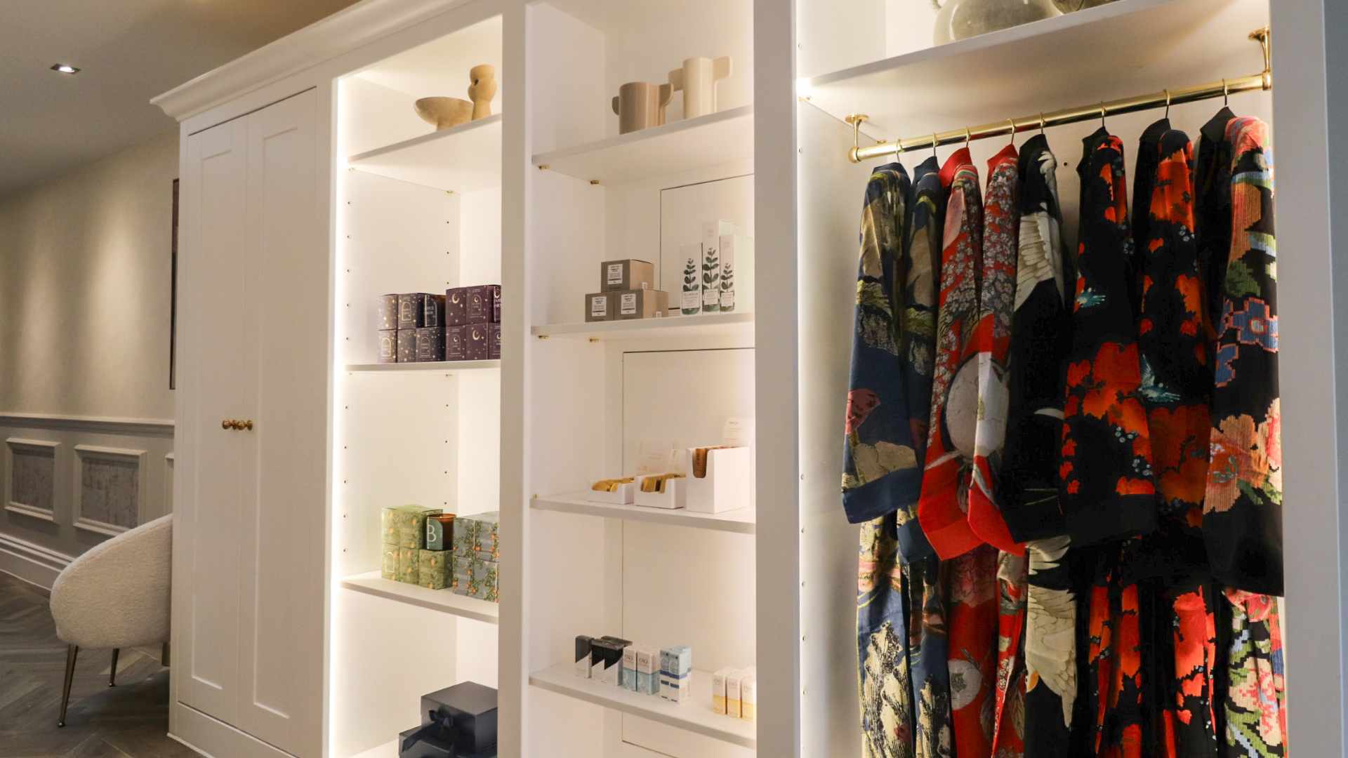 The retail shop display including bath robes, beauty products and luxury skincare brands. 