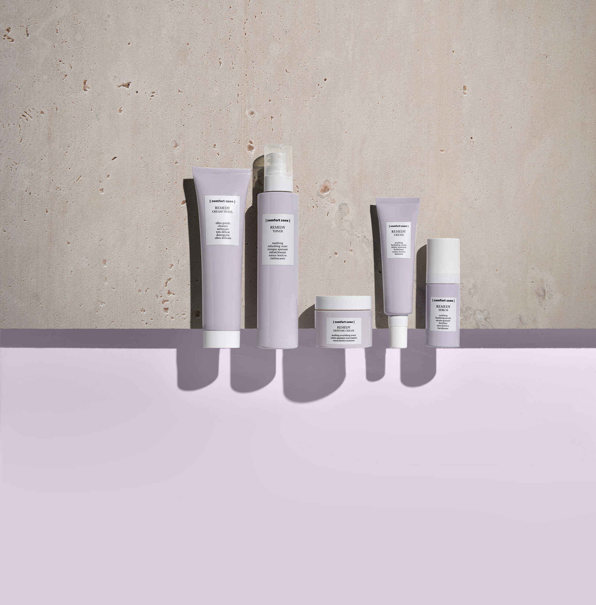 A product image showcasing a comfort zone range of skincare products with a lavender coloured background. 