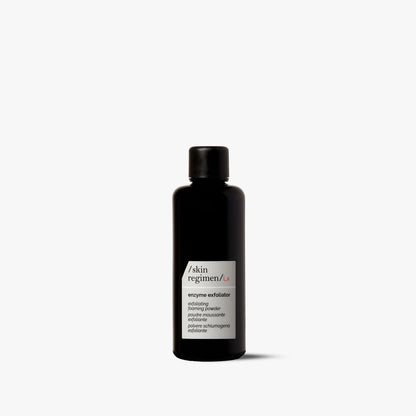 Black bottle of skincare product on a white background