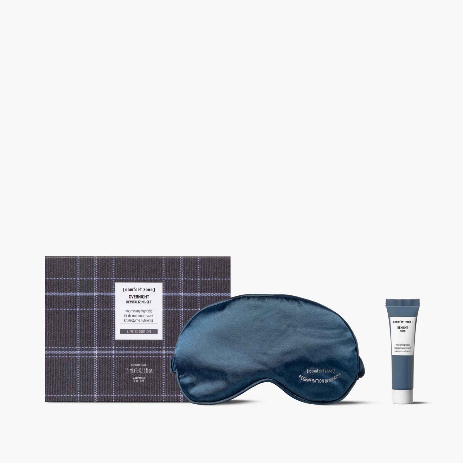 Sleep mask, plaid-patterned box, and tube of cream on a white background