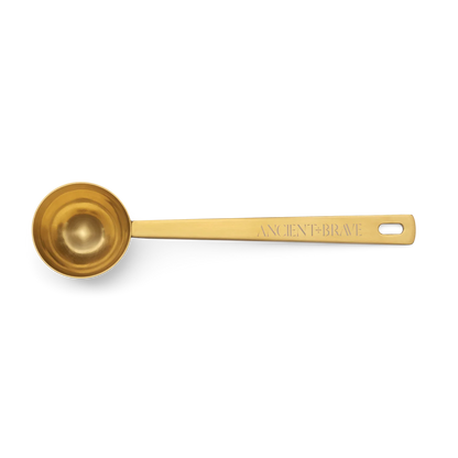 Gold measuring spoon with &