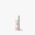 Skincare bottle with pink cap and white label on a white background